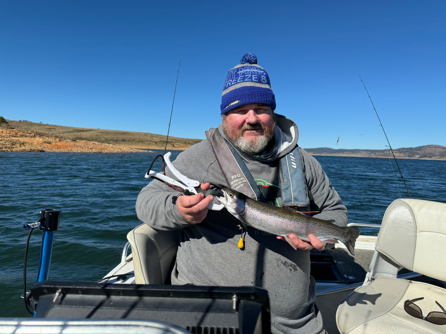 cod pro shop custom hoodie man holding fish, fishing