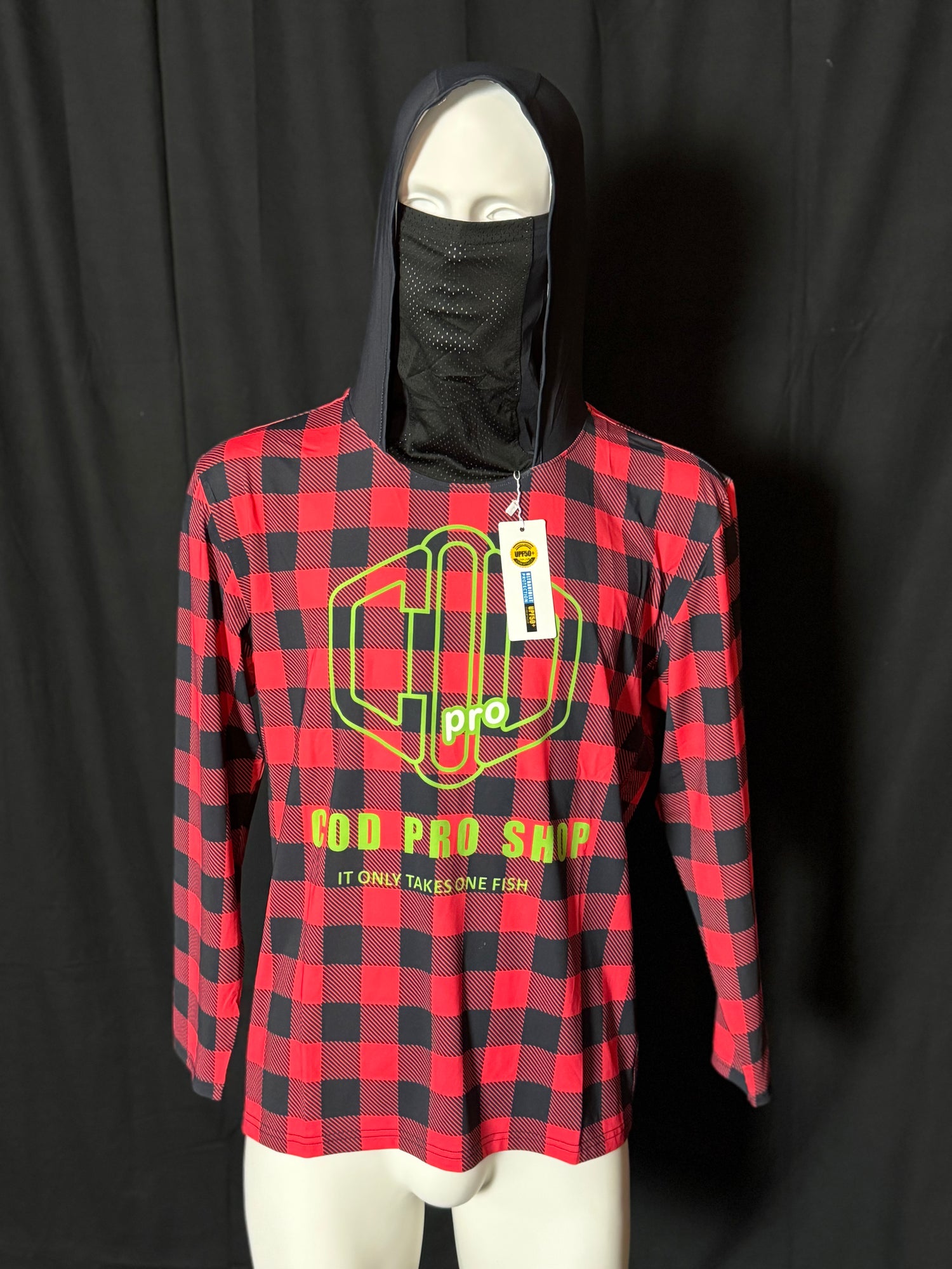 A person wearing a red and black checkered fishing shirt with a hood, featuring a graphic logo, cod pro shop