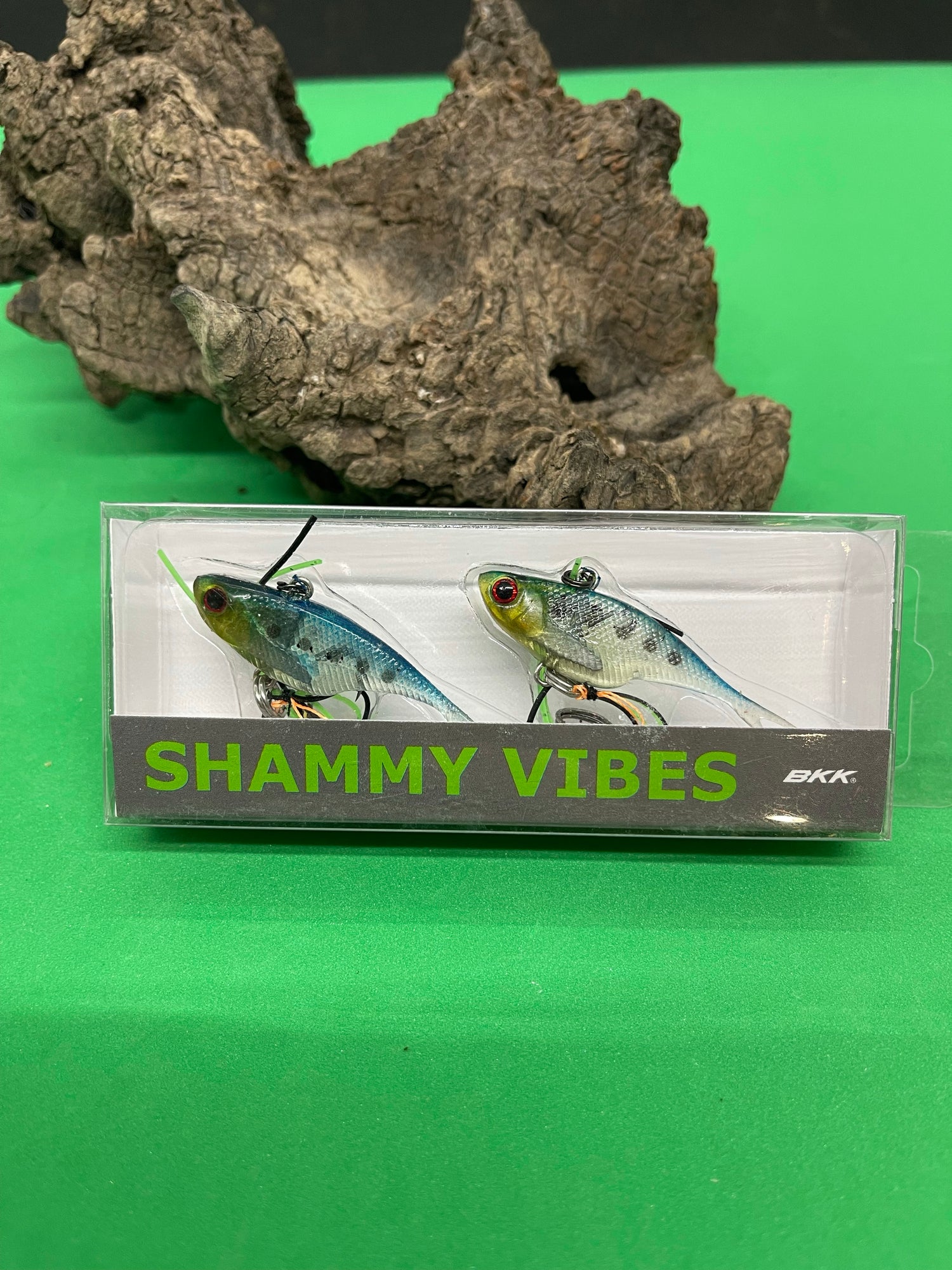 A blue with black spots colour fishing lure named 'Shammy Vibes' soft vibe 55mm yellow belly assist hooks