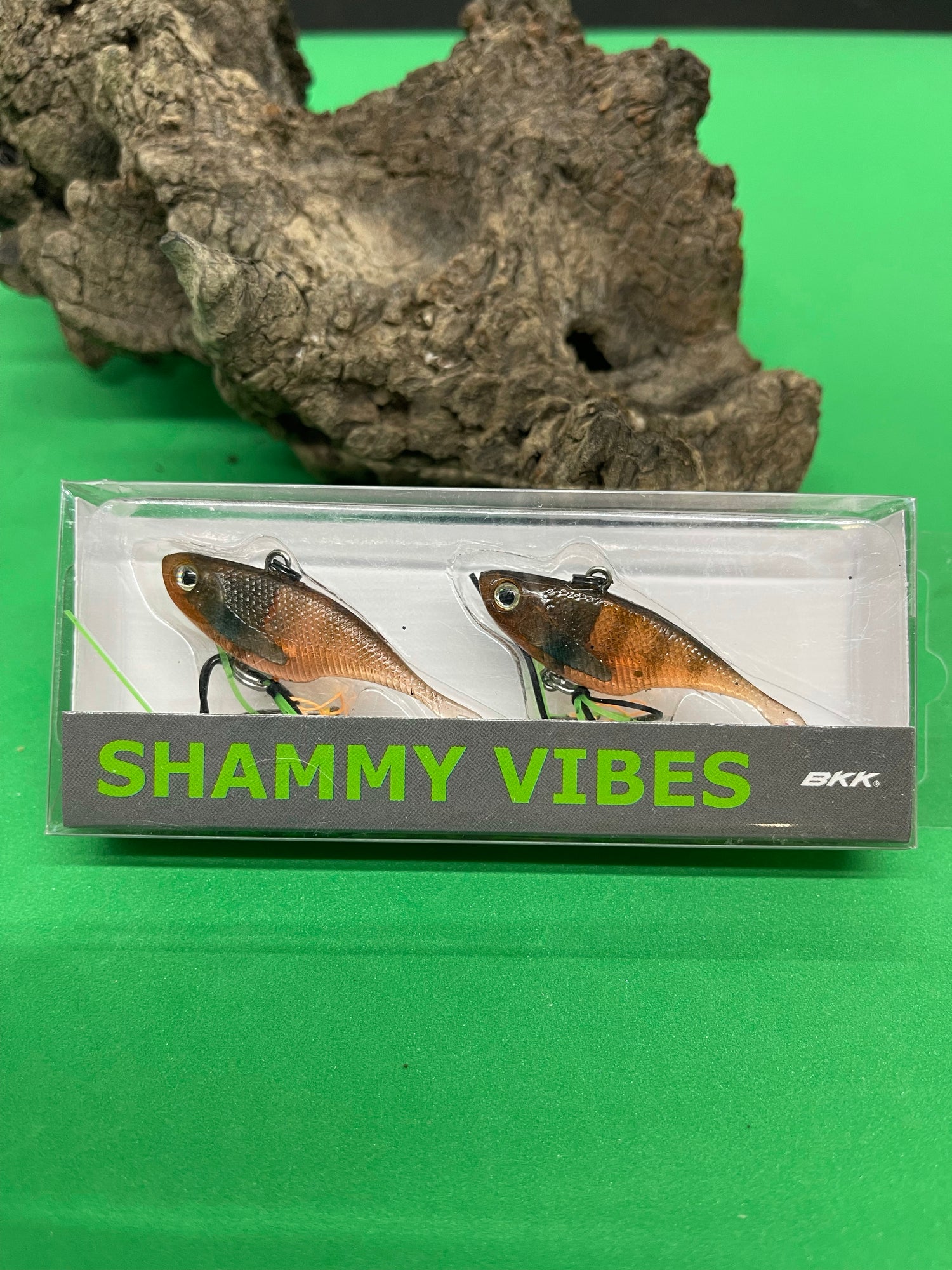 A red with stripes fishing lure named 'Shammy Vibes' soft vibe 55mm yellow belly assist hooks