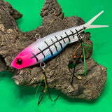 A multicoloured fishing lure with a vibrating tail designed to imitate the movement of fish, equipped with two sets of stinger hooks.