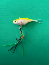 A yellow and white coloured fishing lure named 'Shammy Vibes' soft vibe 55mm yellow belly assist hooks