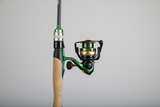 Fishing rod and reel with green accents by cod pro shop